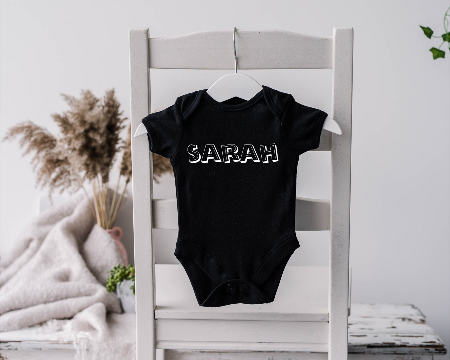 BOLD NAME BODYSUIT