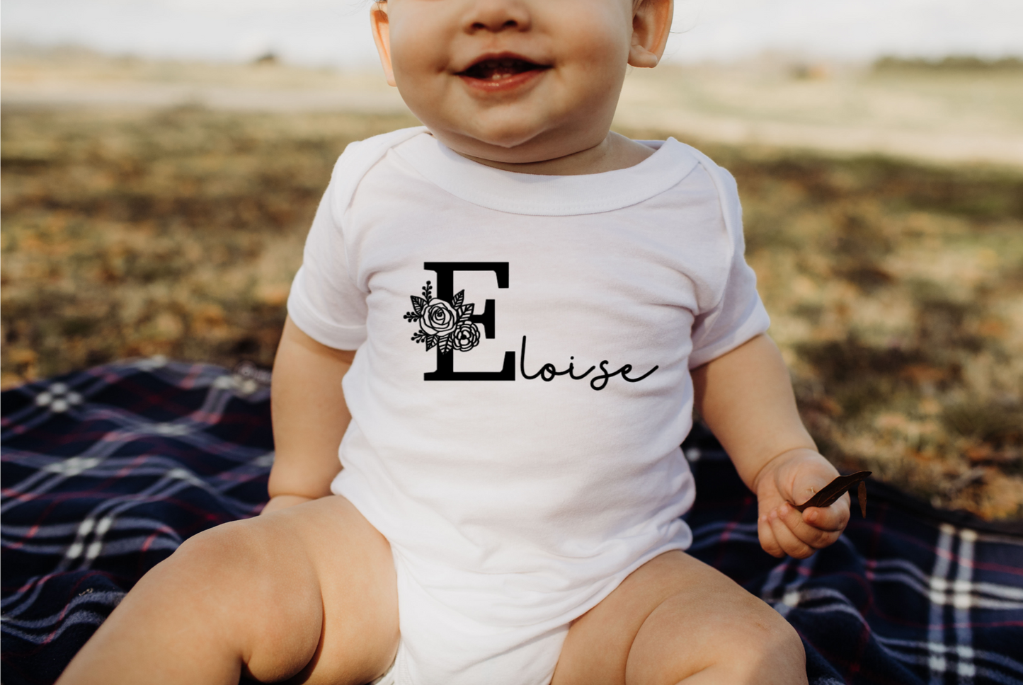 FLORAL INITIAL BODYSUIT