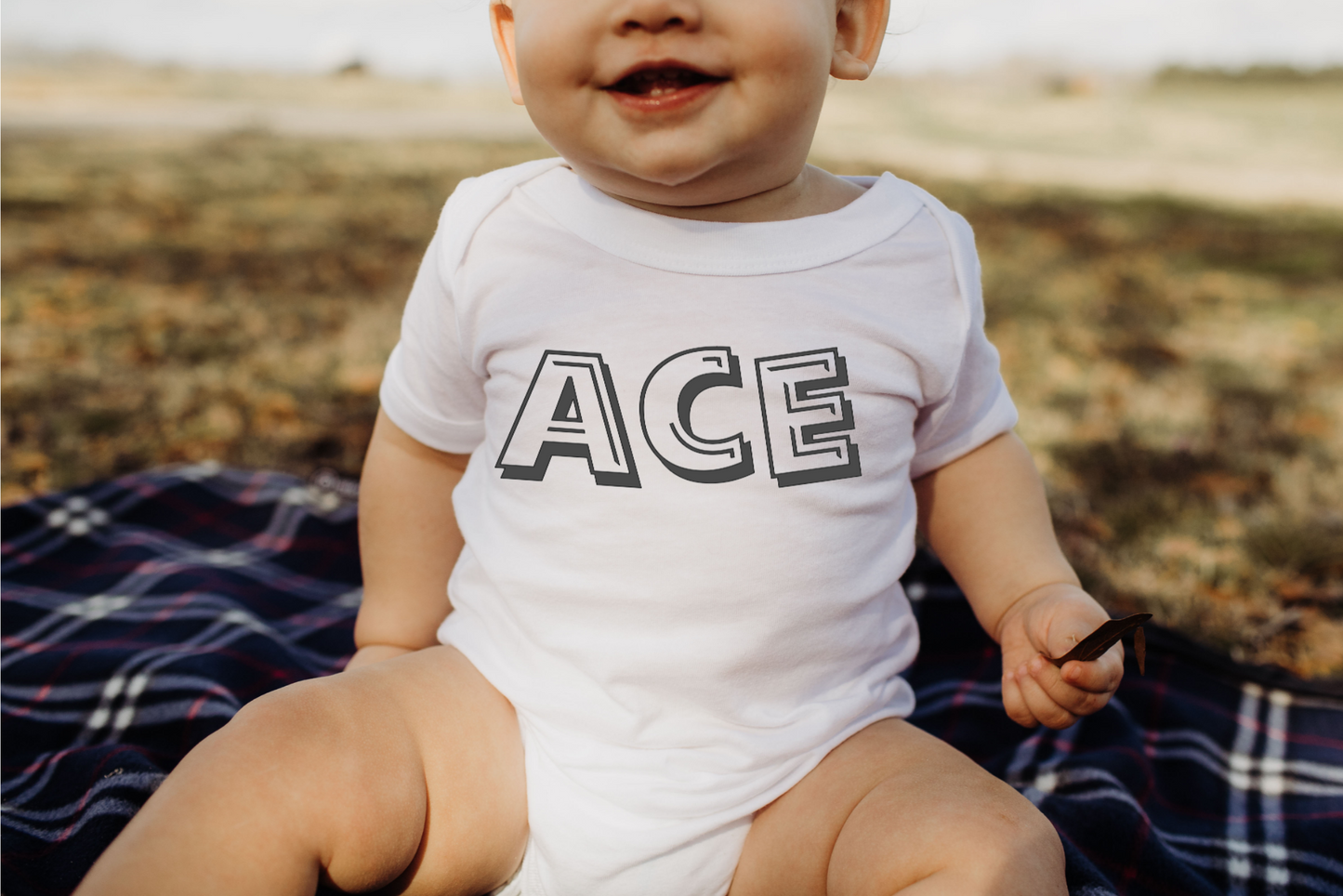 BOLD NAME BODYSUIT
