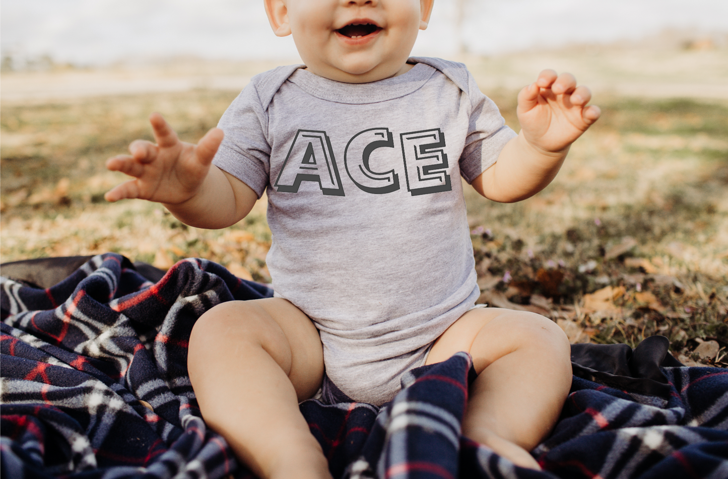 BOLD NAME BODYSUIT